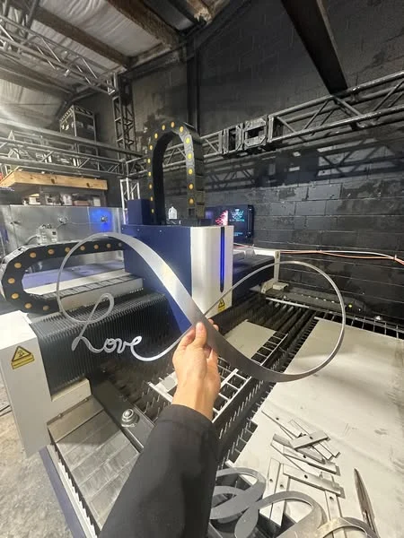 High-speed fiber laser sheet metal cutting in industrial production